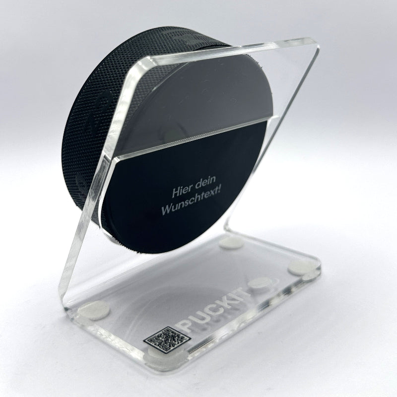 Transparenter Plexiglas Puckhalter von Puckit mit eingelegtem Eishockey-Puck